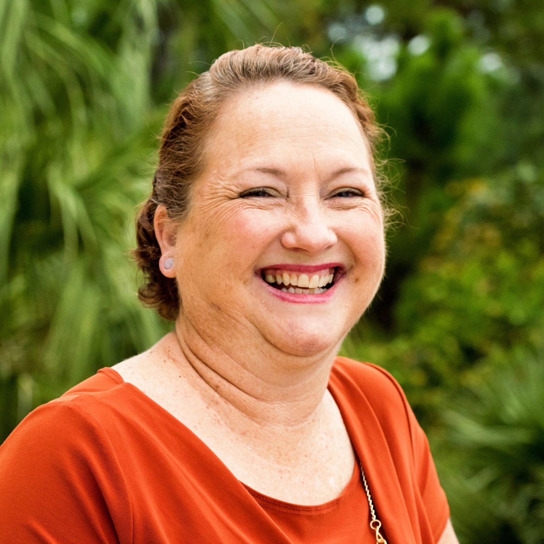 Portrait of a smiling mature woman outdoors